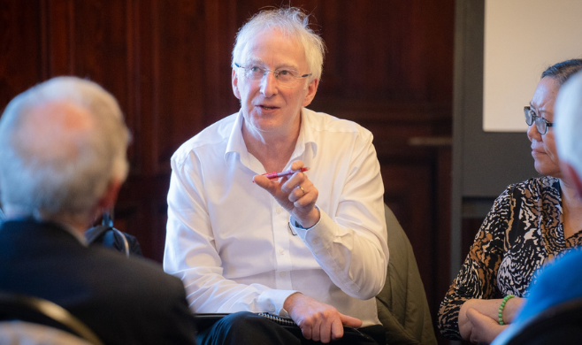 dr ed newell talking to a group of people
