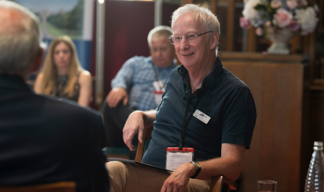 dr ed newell talking at a programme