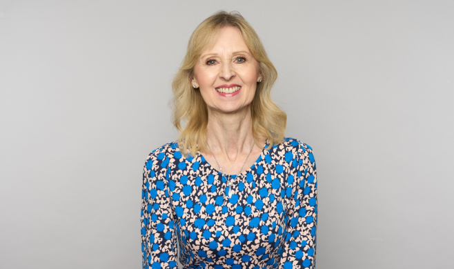 Jane Hughes smiling at camera