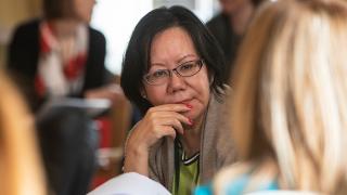 Female participants talking.