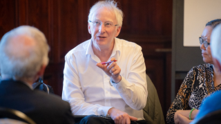 dr ed newell speaking to a group of people